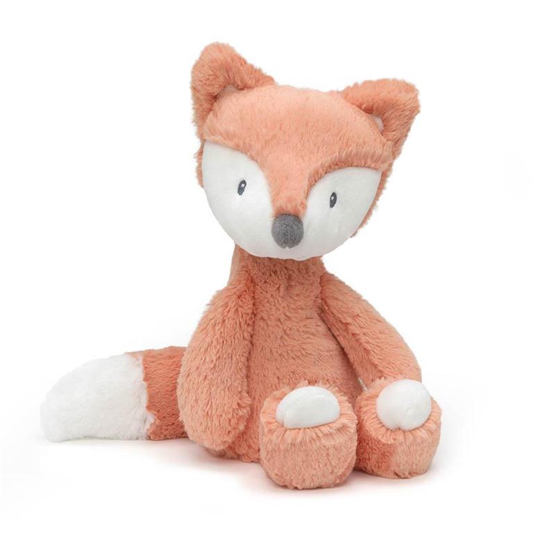 Orange and white fox stuffed animal sitting up.