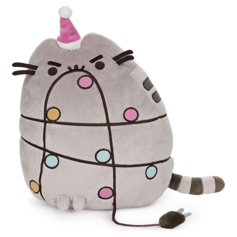 Gray Pusheen plush toy with a pink Santa hat and decorative Christmas lights.