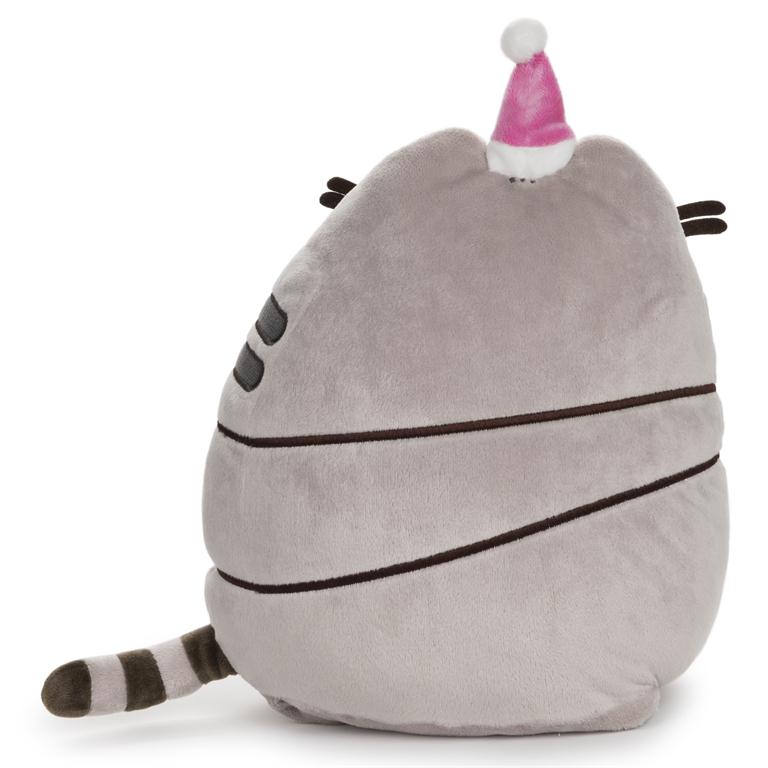 Gray, plush Pusheen cat wearing a pink Santa hat with white trim and a pom-pom.