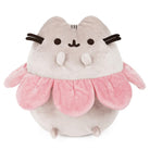 A plush gray Pusheen cat wearing a pink flower collar.