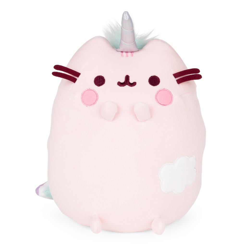 Stuffed Pusheen unicorn toy in pink with a white cloud.