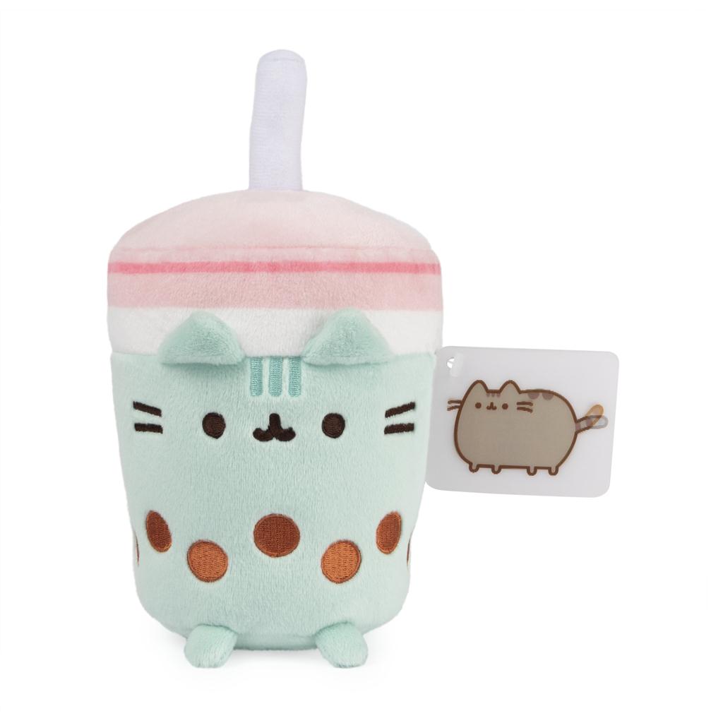 Plush toy shaped like a boba tea with Pusheen cat face and hang tag.