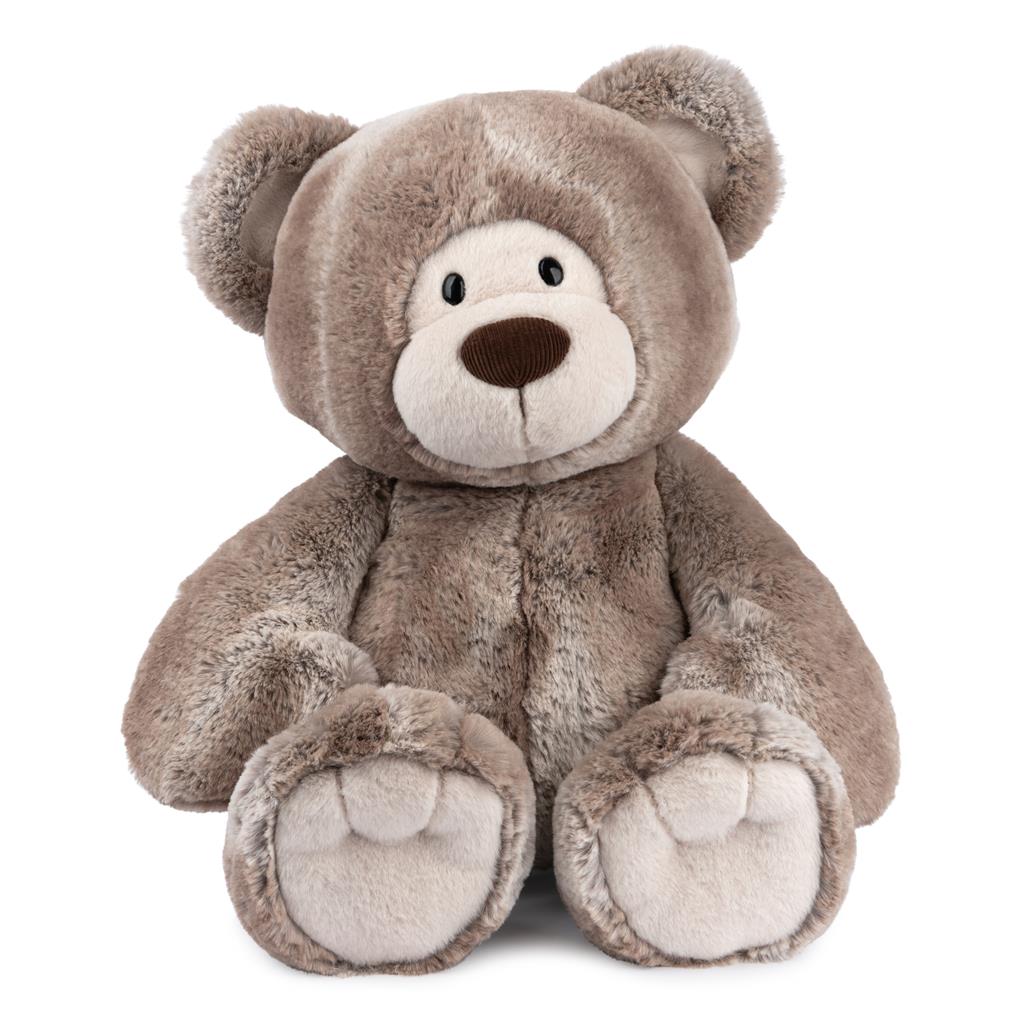 Brown plush teddy bear sitting.