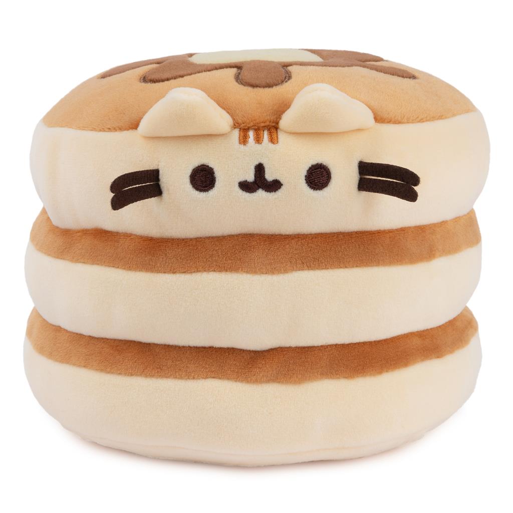 Brown and tan pancake stack plush toy with cat face.