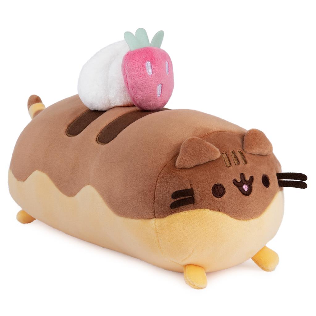 Brown Pusheen cat plush with strawberry accessory.
