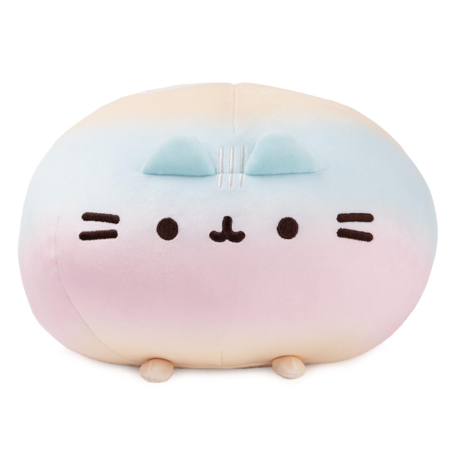 Round, pastel-colored Pusheen plush with embroidered face.