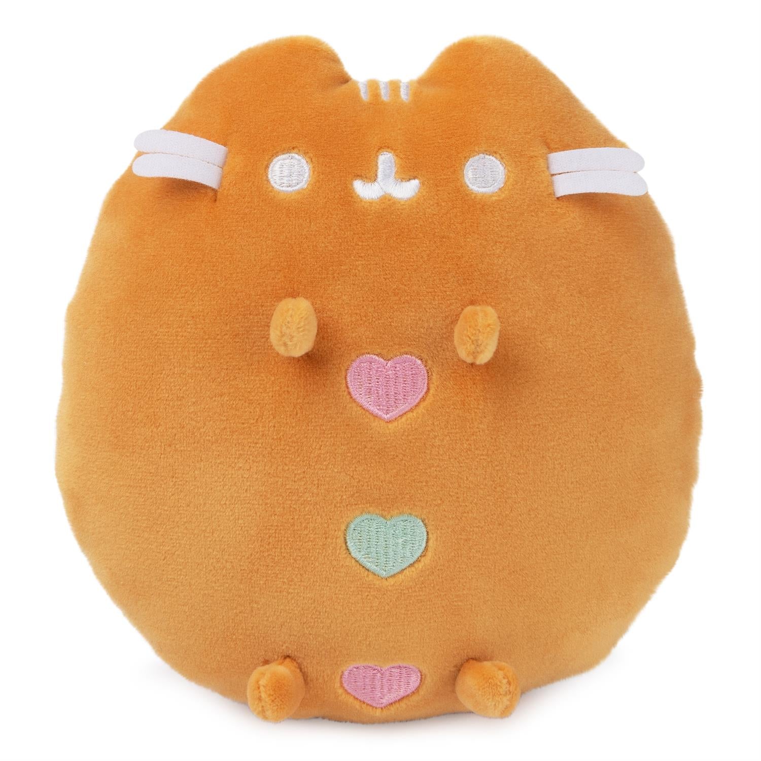 Orange Pusheen plush with embroidered hearts.