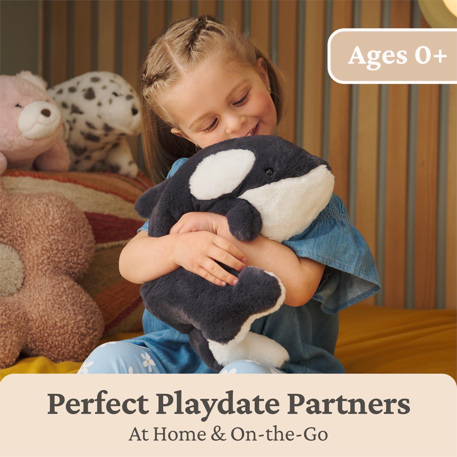 Child holding a plush toy with text 'Perfect Playdate Partners' and 'Ages 0+'