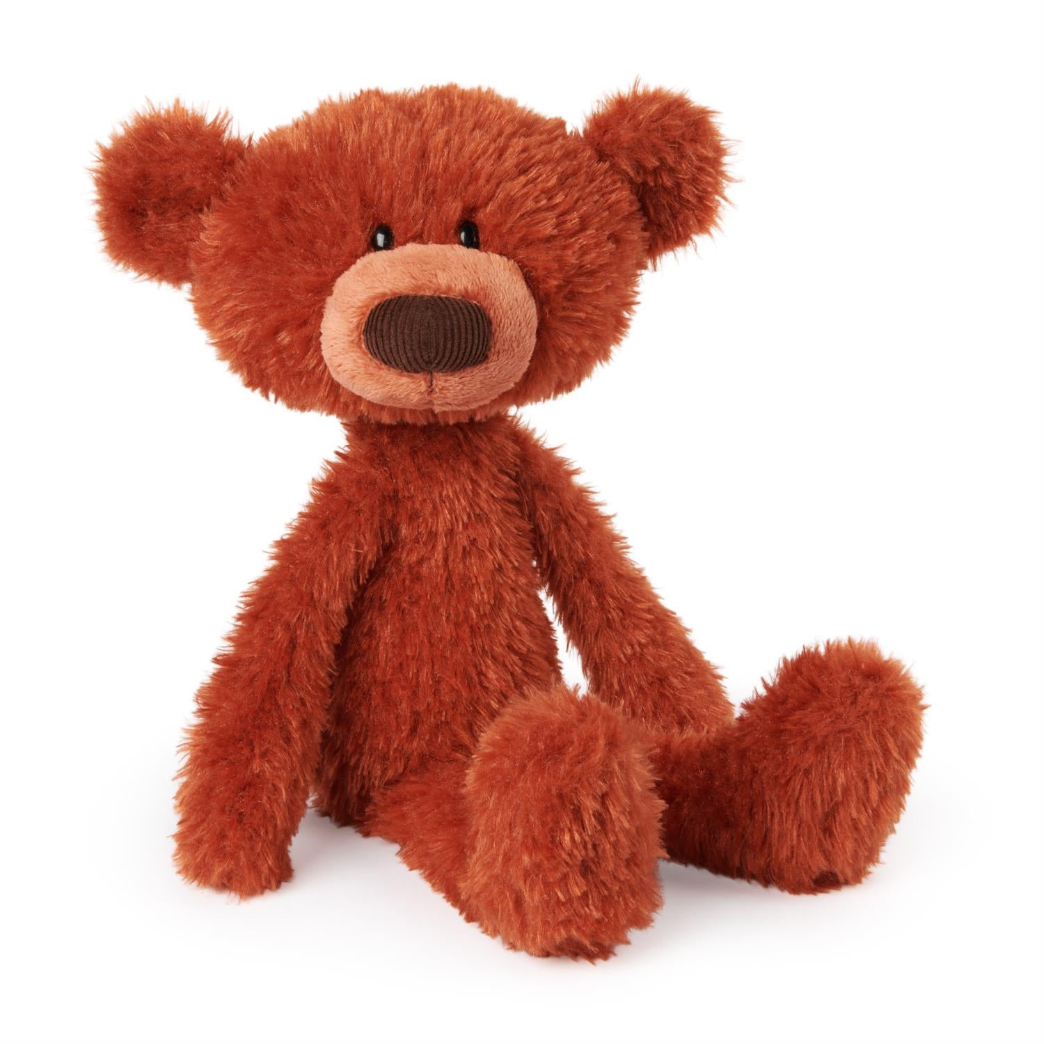 Brown stuffed teddy bear sitting upright.