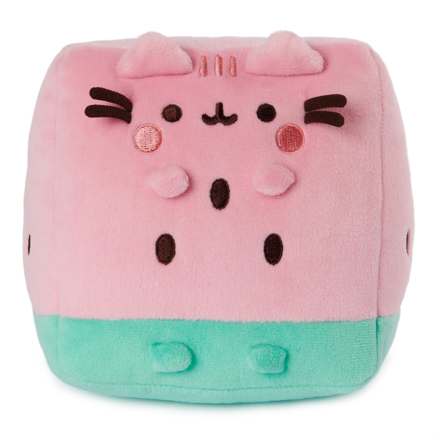 Square, pink plush cat toy with watermelon-green base.