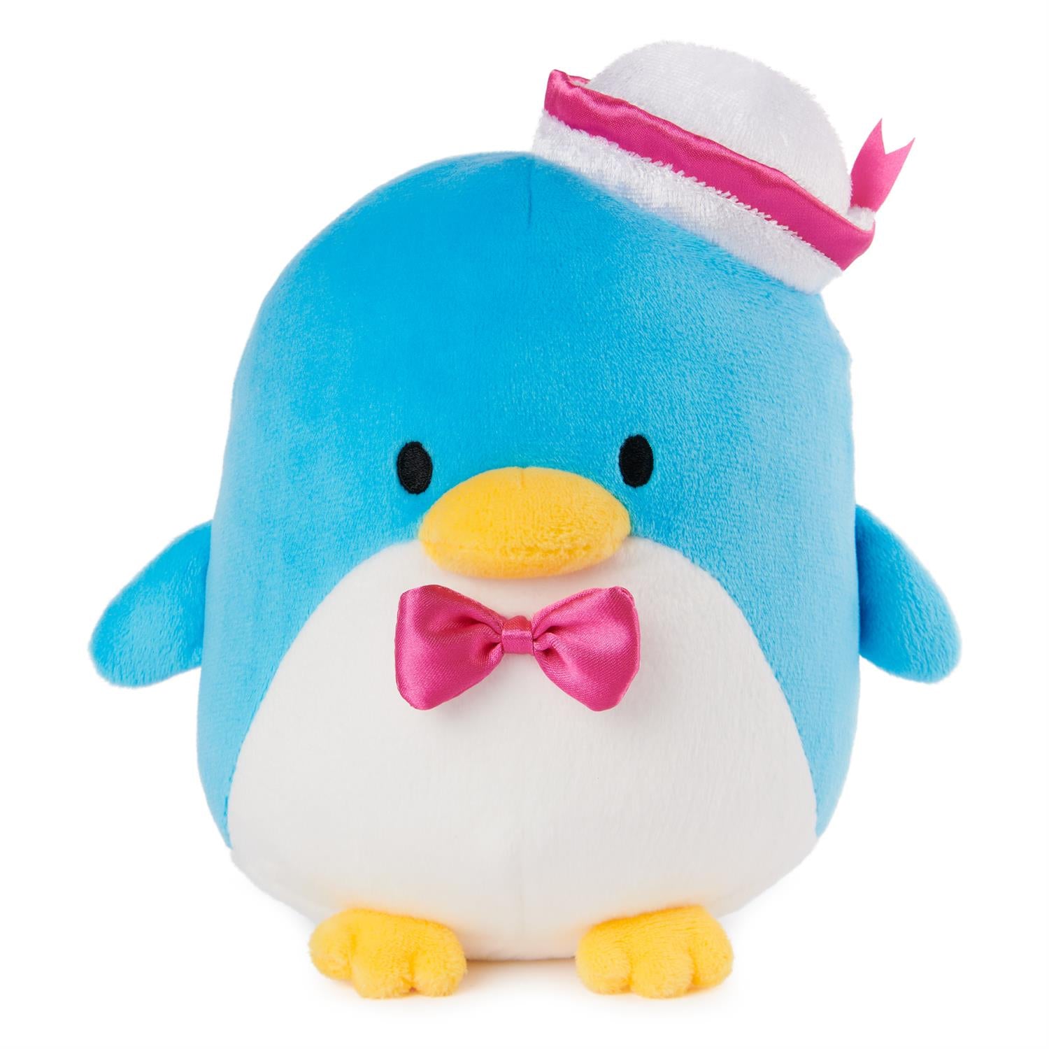 Blue penguin plush toy with a bow tie and sailor hat.