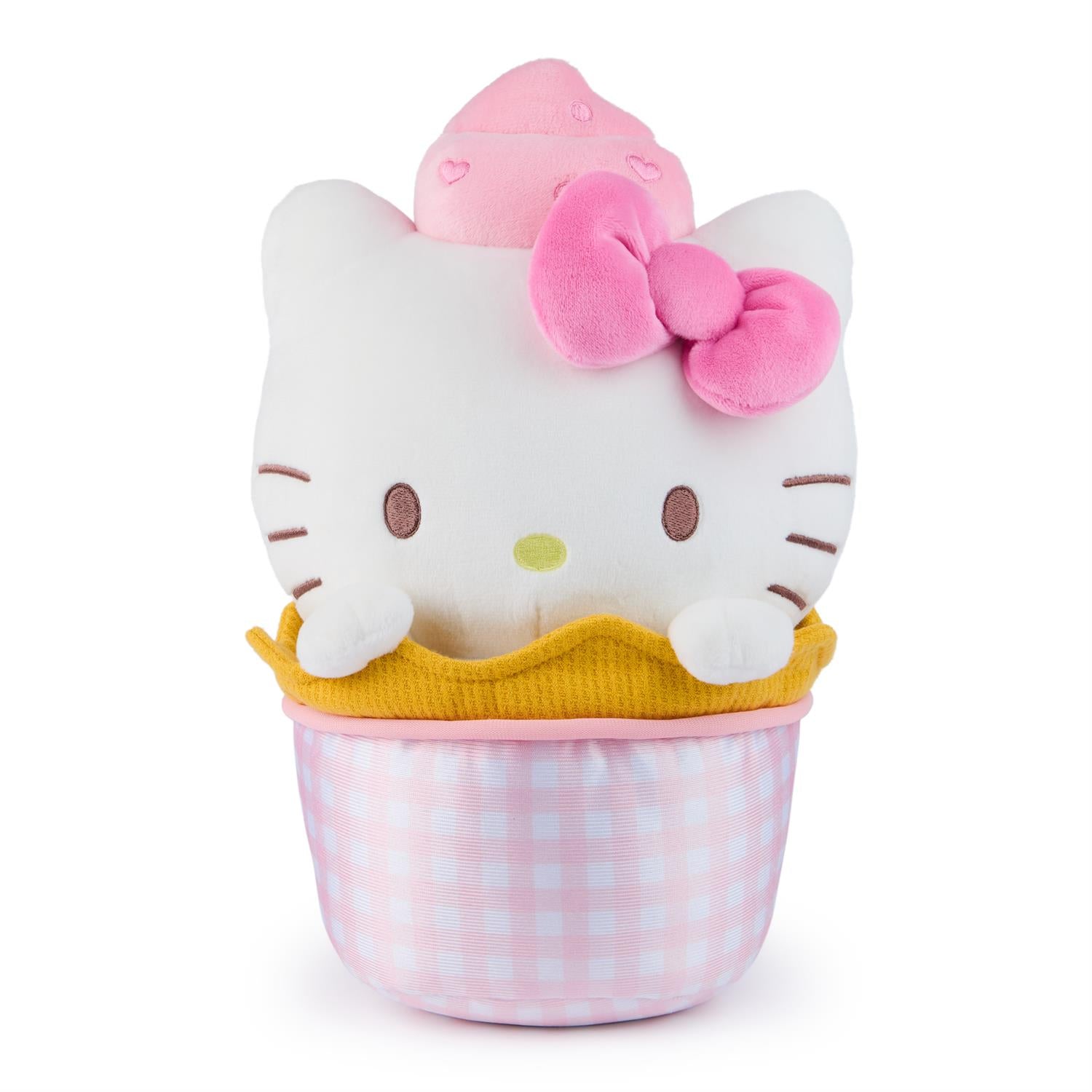 Stuffed Hello Kitty cupcake toy.