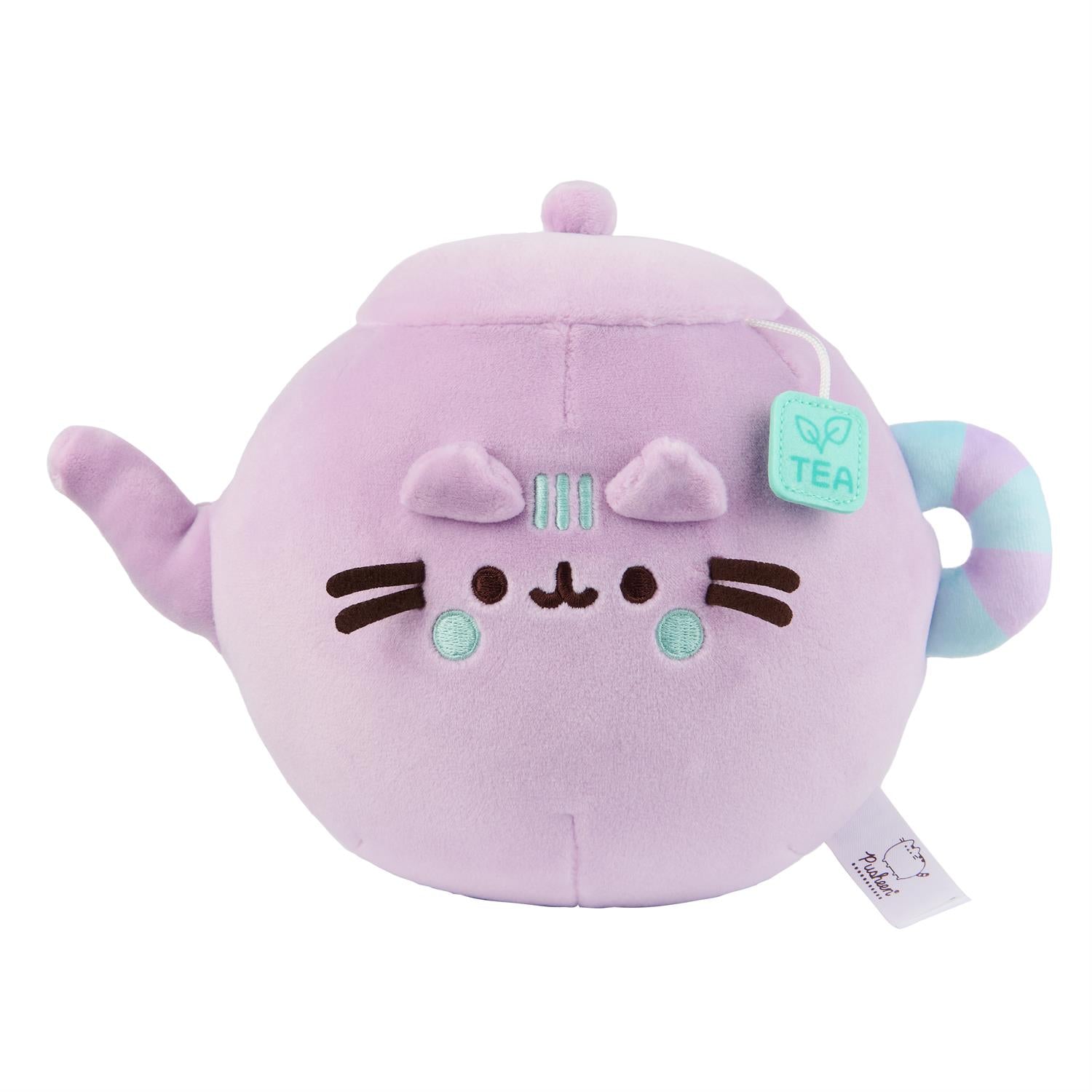 Purple teapot-shaped Pusheen plush toy with a teabag label.