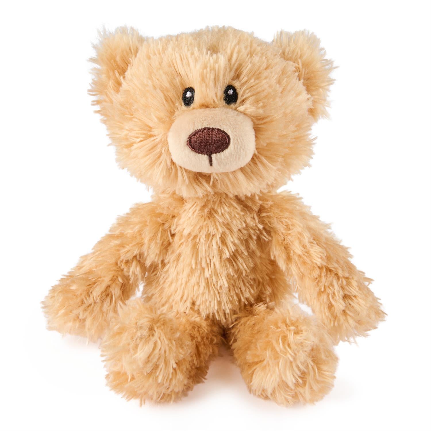 Light-brown teddy bear sitting.