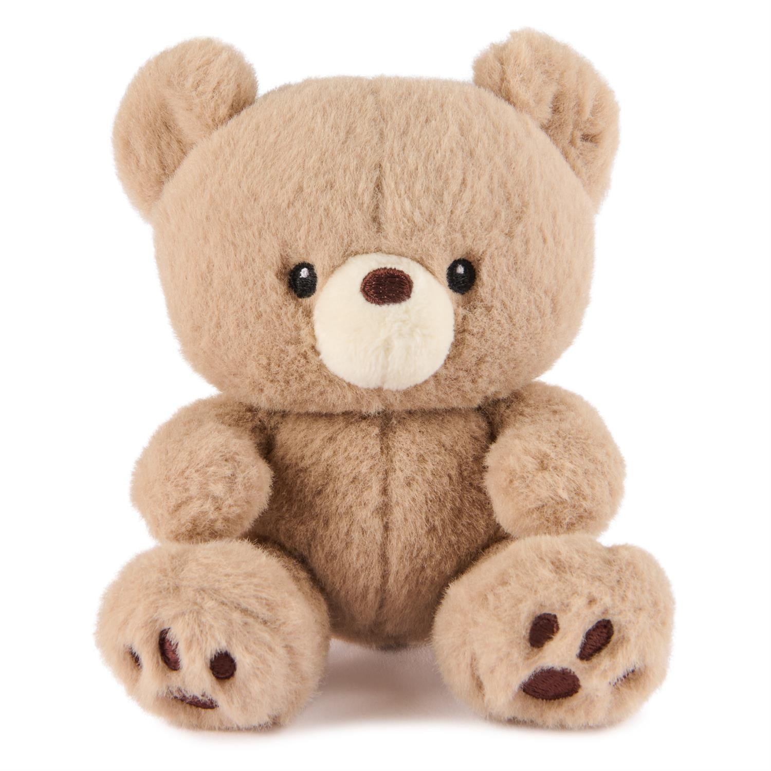 Tan stuffed teddy bear.