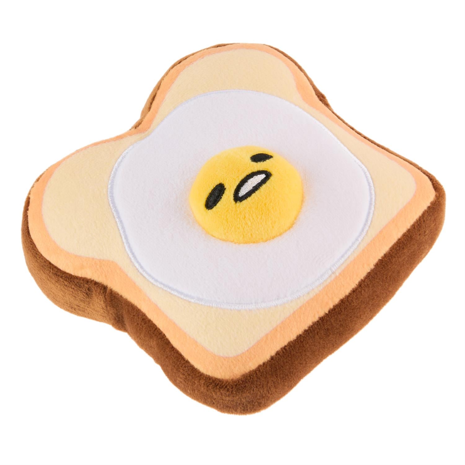 A plush toy shaped like a slice of toast with a fried egg on top.