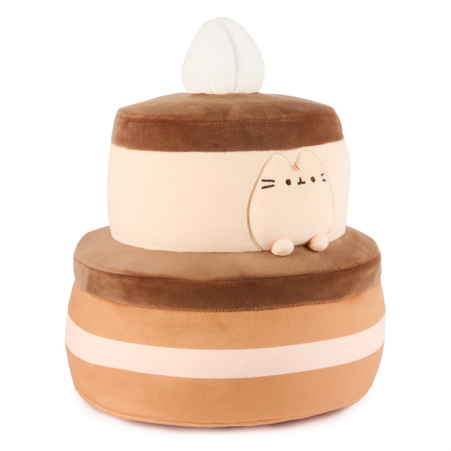 A Pusheen plush cake pillow.