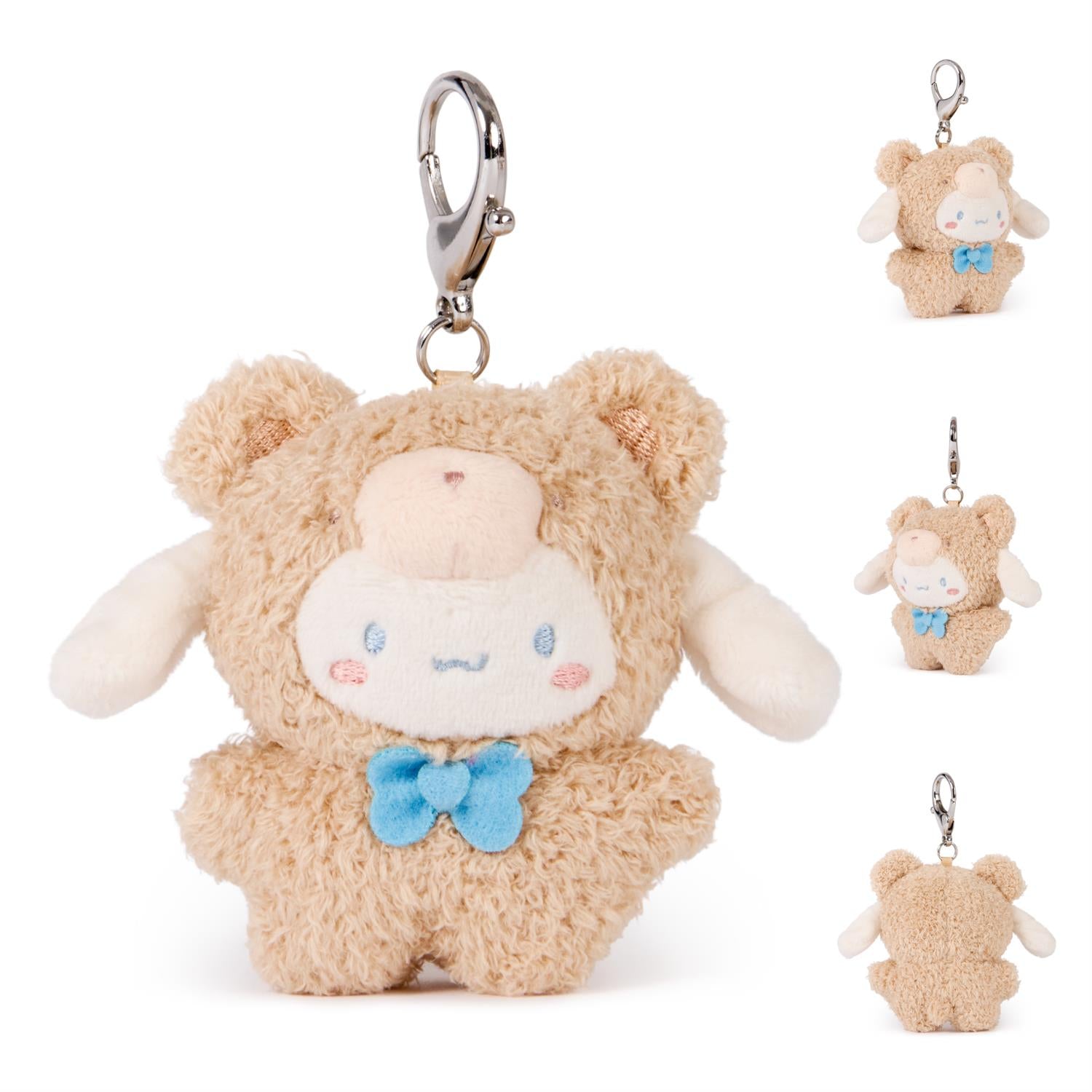 Plush, brown bear keychain with white face and blue bow.