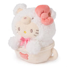Hello Kitty plush toy dressed as a sheep in a teacup.