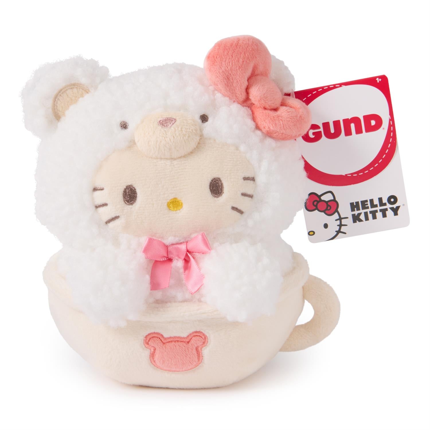 Hello Kitty Gund plush in a teacup with a bear costume.
