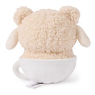 Back view of a stuffed teddy bear toy in a white cup.