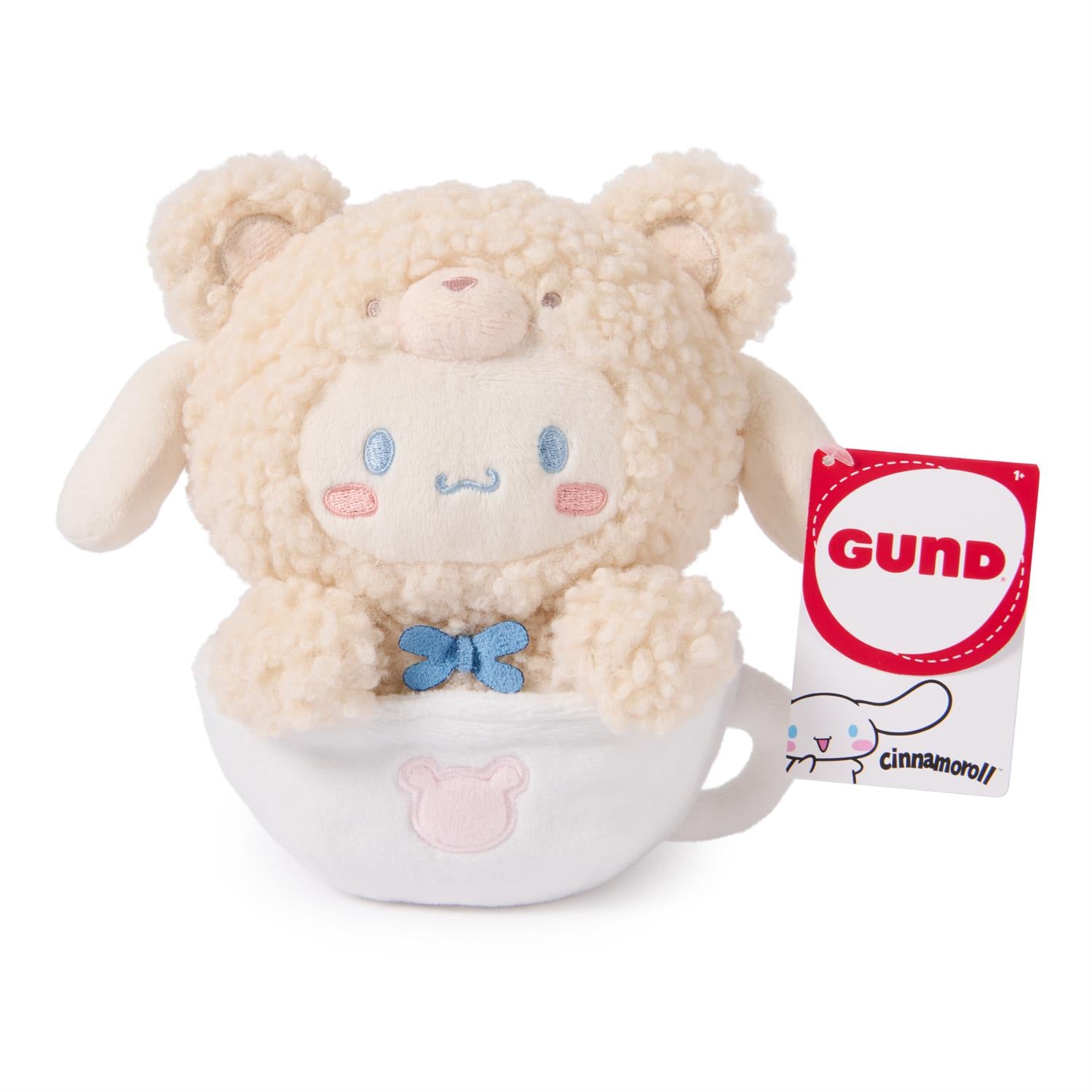 Stuffed bear in a teacup with a Gund tag.