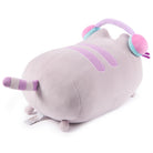 Lilac cat plush with headphones.