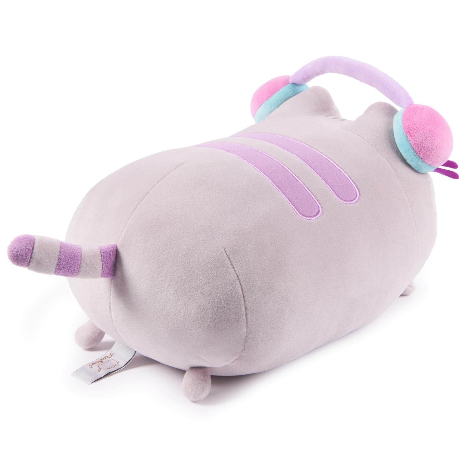 Lilac cat plush with headphones.