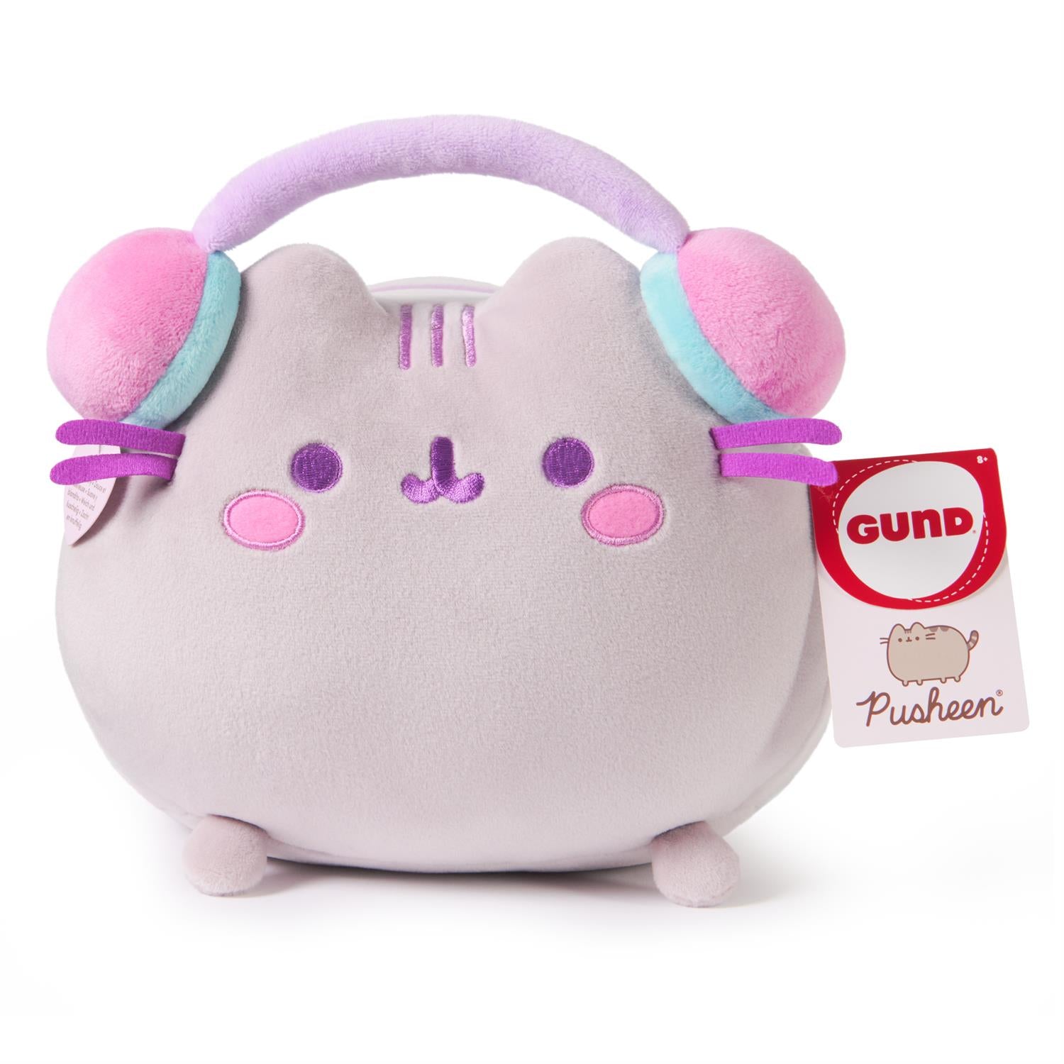 Pusheen plush toy with headphones.