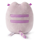 Rear view of a purple Pusheen plush with a striped tail.