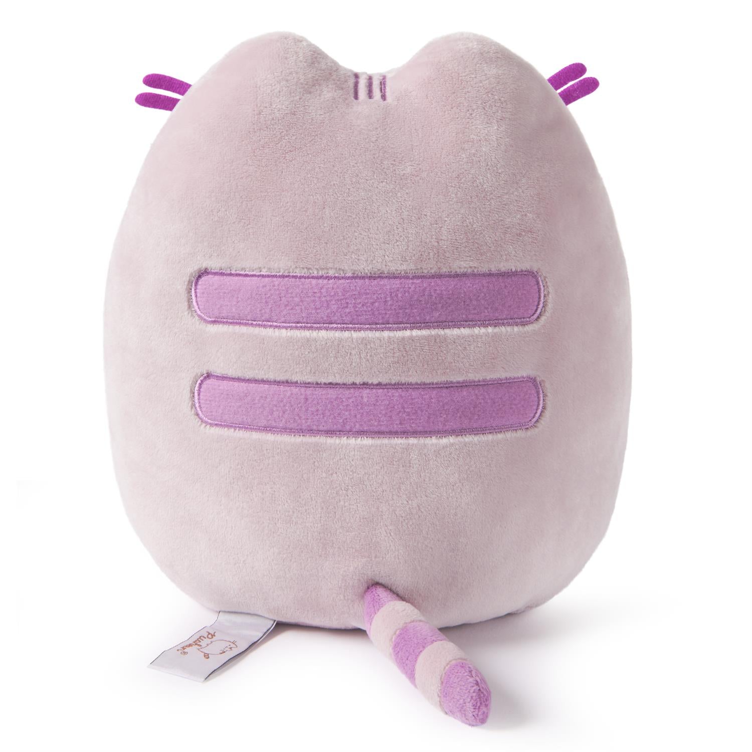 Rear view of a purple Pusheen plush with a striped tail.