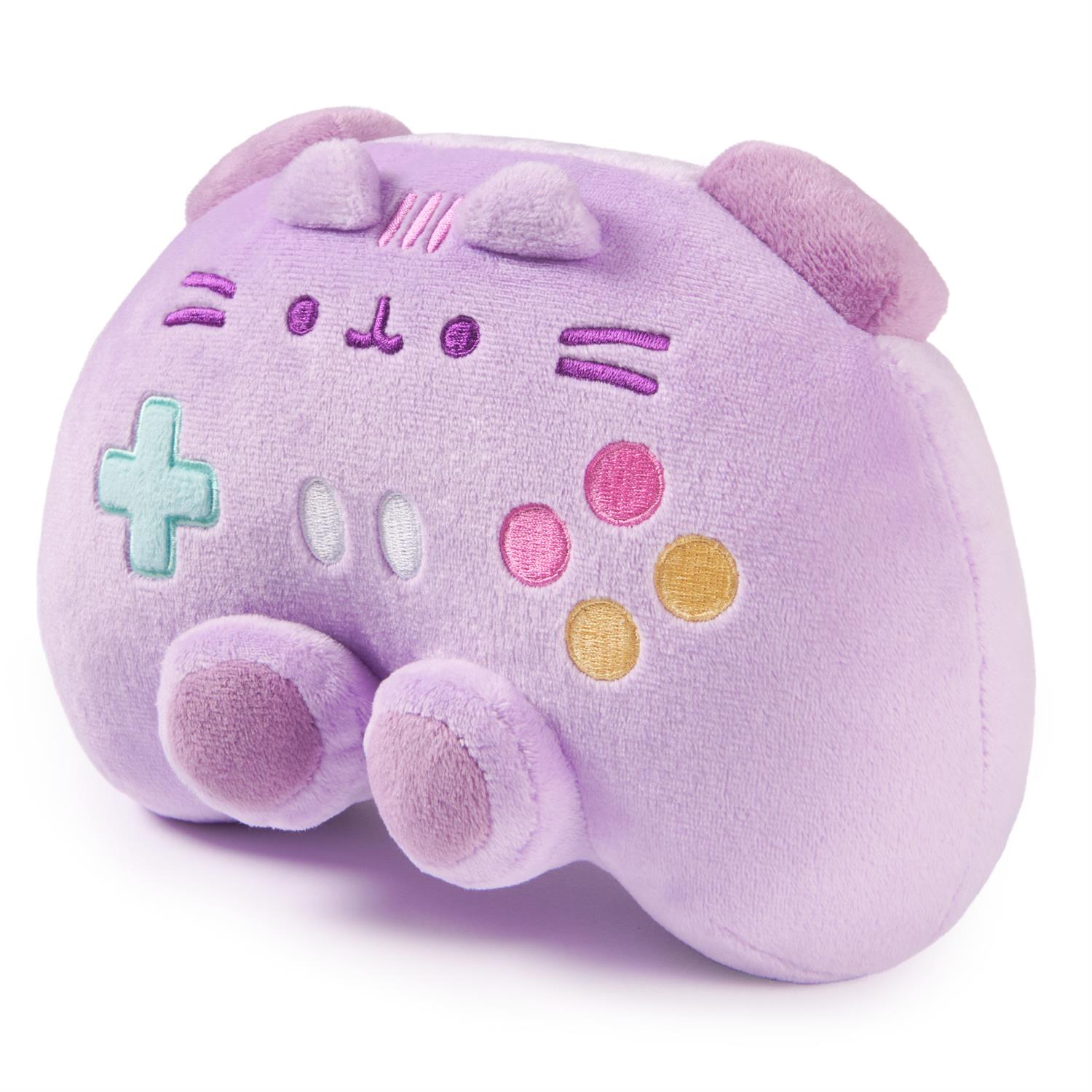 A purple plush toy resembling a gaming controller with cat-like features.