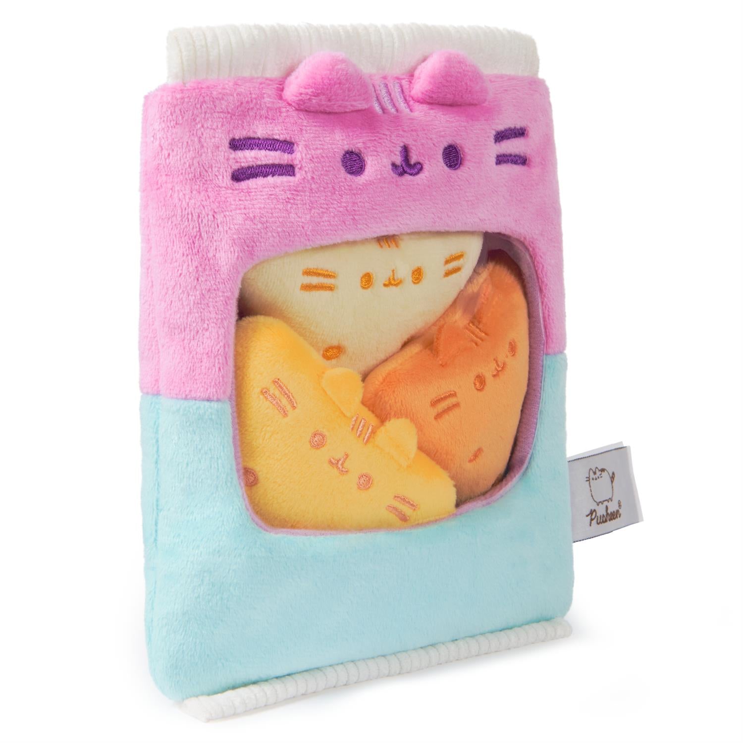 Plush toy of cats in a pink and blue house-like container.