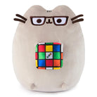 Pusheen plush toy with glasses and Rubik's cube.
