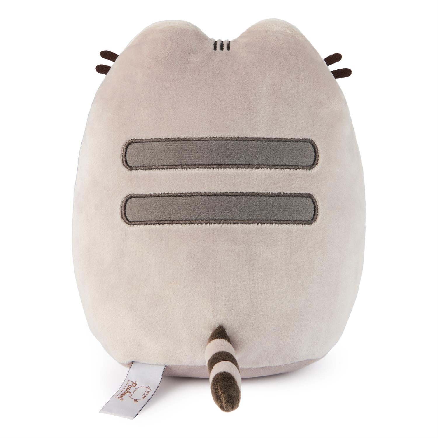 Back view of a Pusheen plush toy.