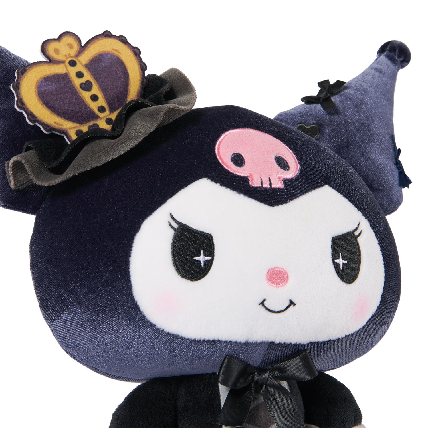 Kuromi plush doll with crown and skull.
