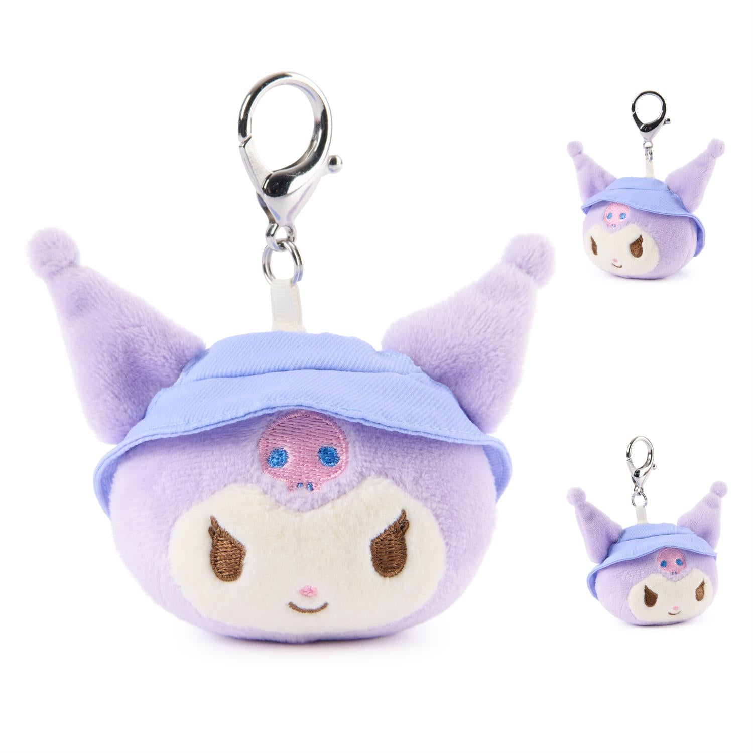 Plush keychain with a character wearing a blue hat and purple outfit on a white background