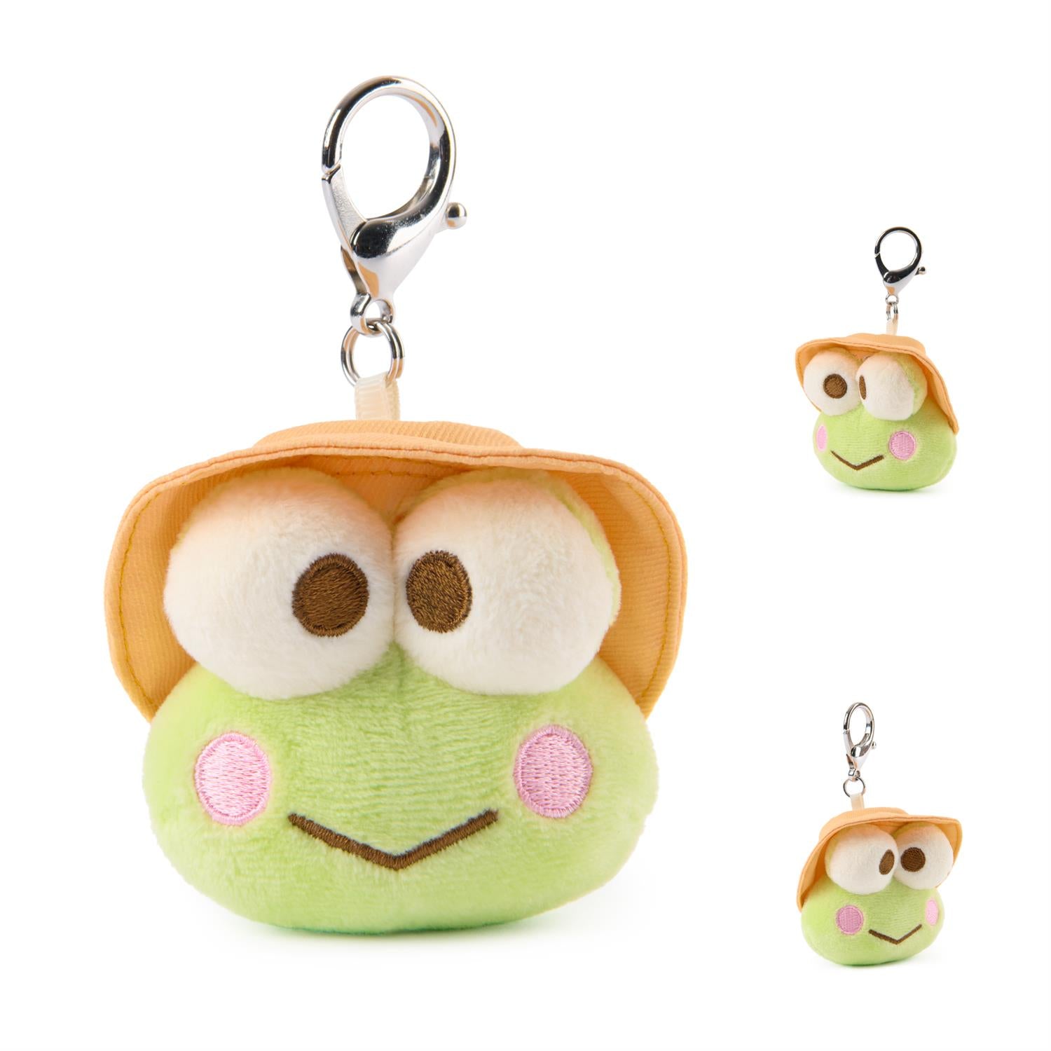 Plush frog keychain with a helmet on a white background