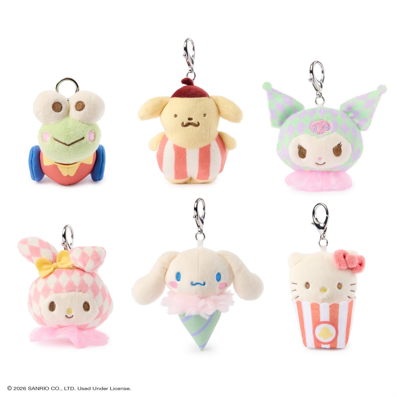 Set of six colorful plush keychains on a white background