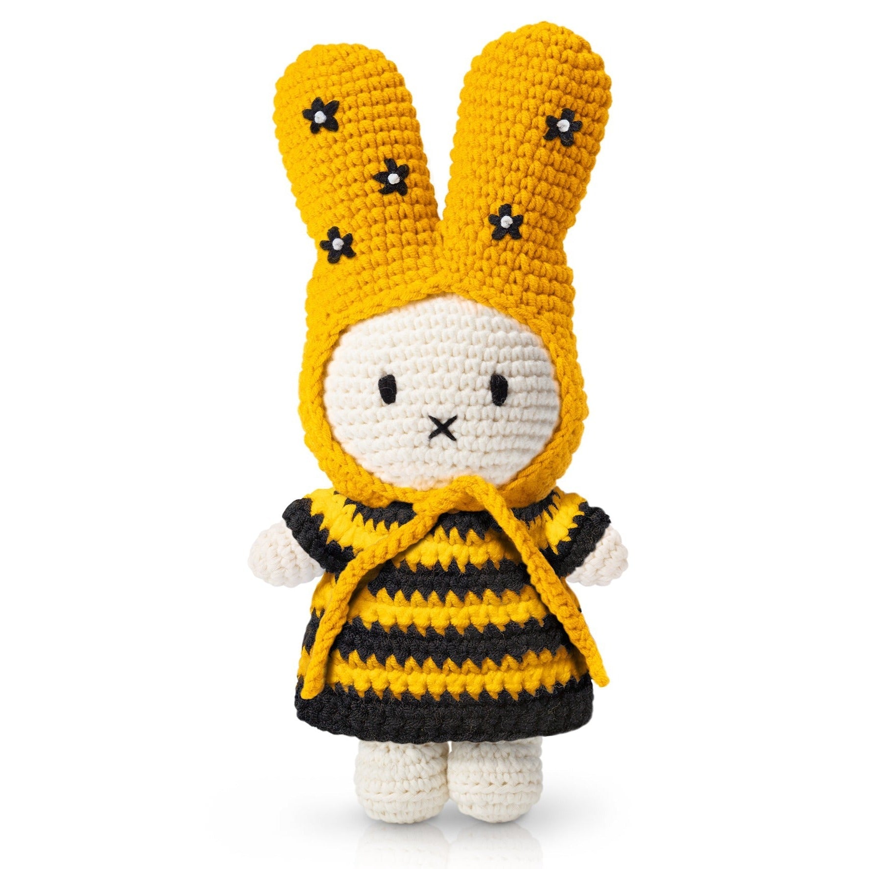 Crocheted rabbit toy in a yellow, black, and white bee costume.