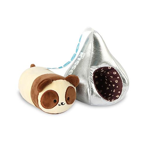 A panda pillow and a Hershey's Kiss-shaped pet bed on a white background.