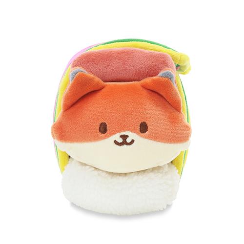 Fox plush toy with colorful wrap.