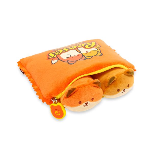 Orange plush pouch with two fox plushies inside.