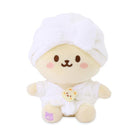 Stuffed plush toy in towel head wrap and robe.