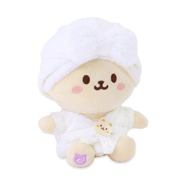 Stuffed animal wearing towel turban and robe.
