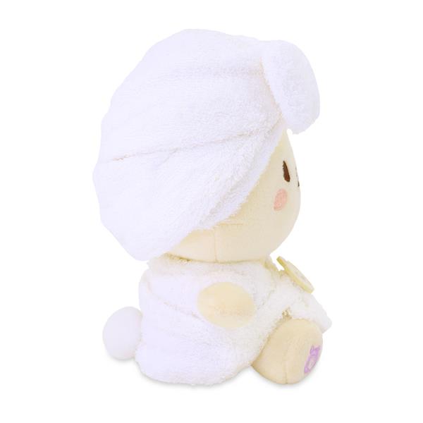 Plush toy with white towel wrap on head and white bathrobe.