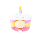 Plush cupcake toy with candle.