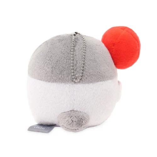 Gray and white plush toy with a red pompom and a chain.
