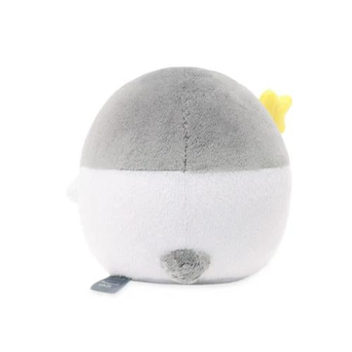 Gray and white plush toy with a yellow star.