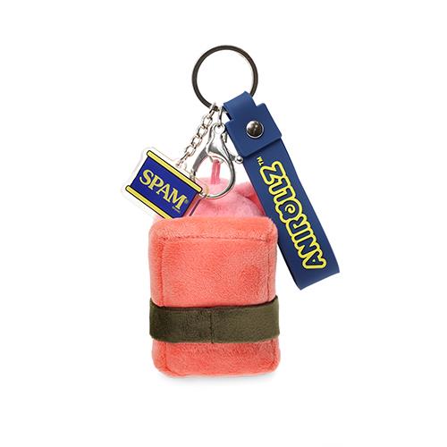 Keychain with a plush salmon nigiri charm, a Spam logo, and a blue tag that reads "ANIR OLLZ".